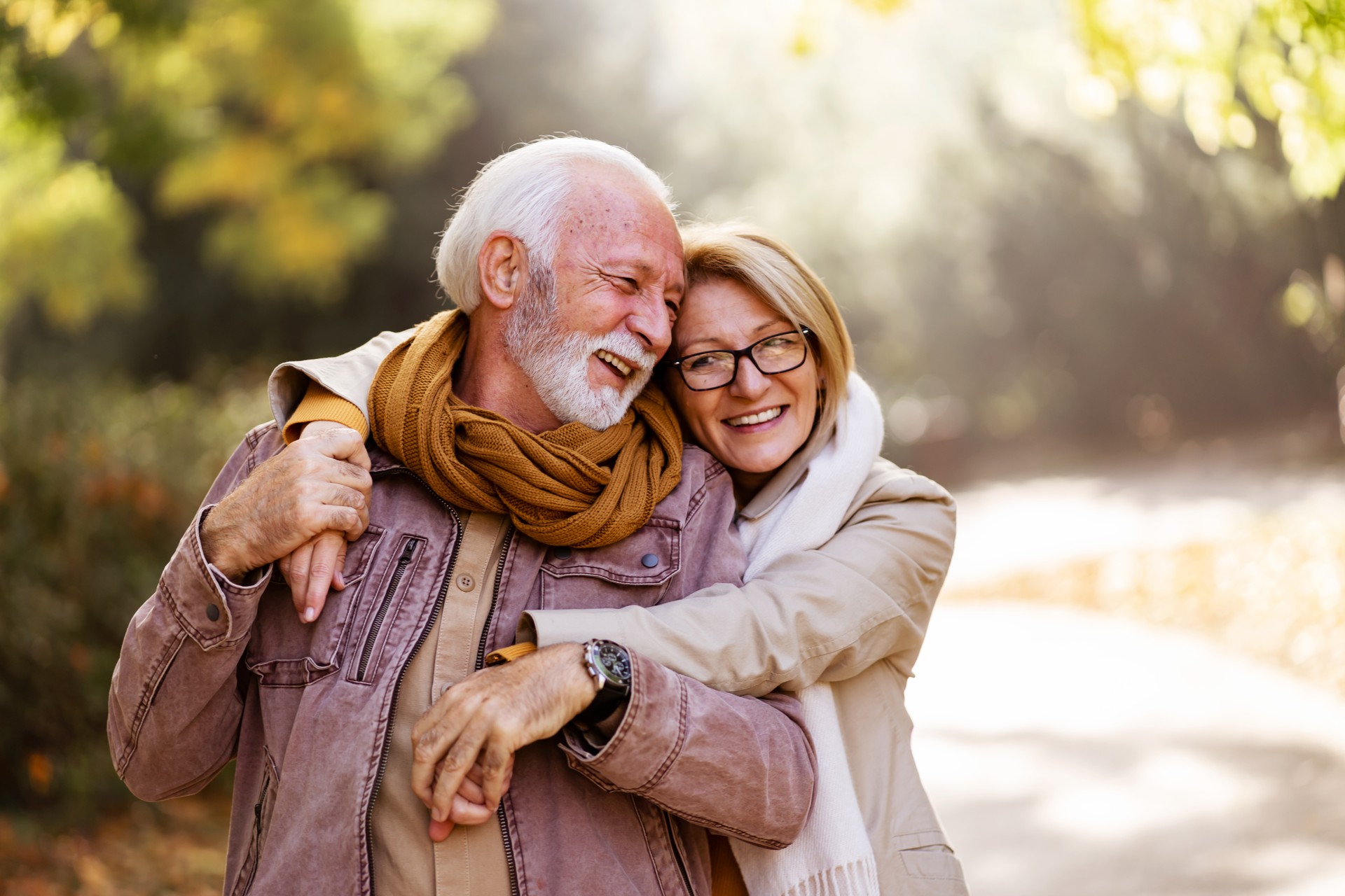 Portrait of a beautiful senior couple in the public park. Early retirement